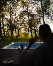 A serene scene of a public servant enjoying free time outdoors, symbolizing financial freedom.