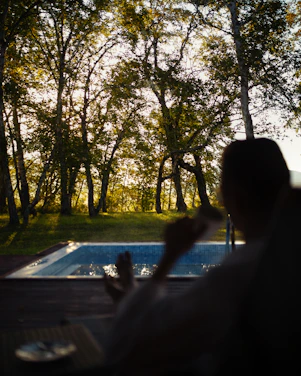 Peaceful morning session by the pool with gentle water meditation and soft sunlight.