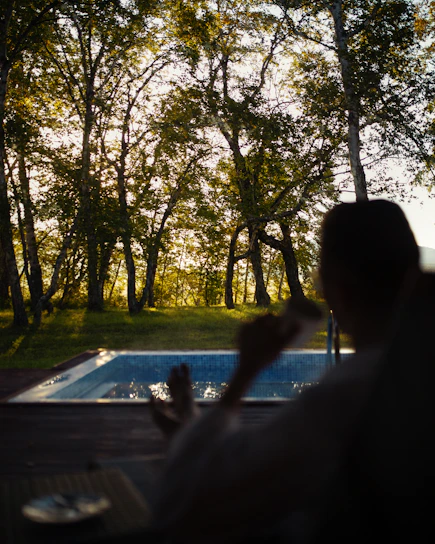 Peaceful morning session by the pool with gentle water meditation and soft sunlight.