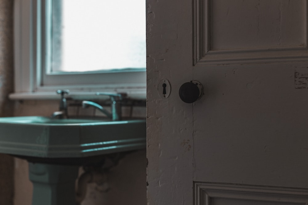 white wooden door with silver lever