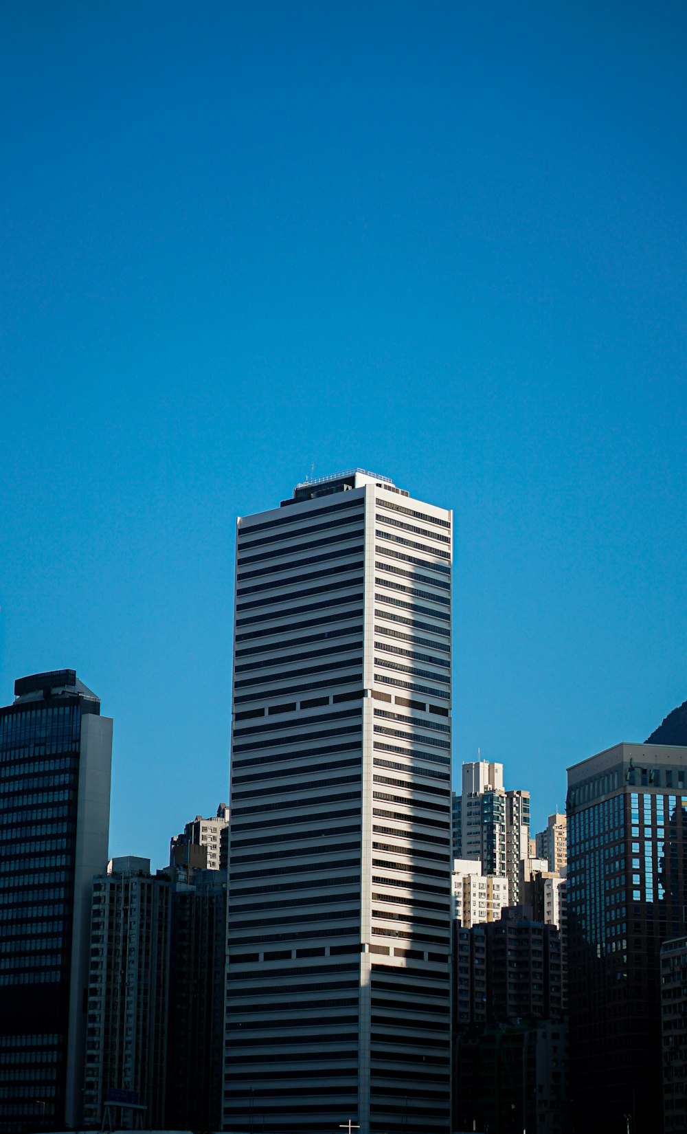 white and brown concrete buildings under blue sky during daytime