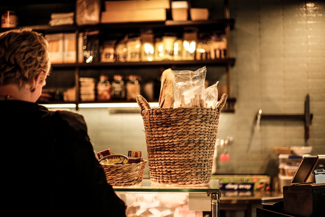 brown woven basket on white shelf