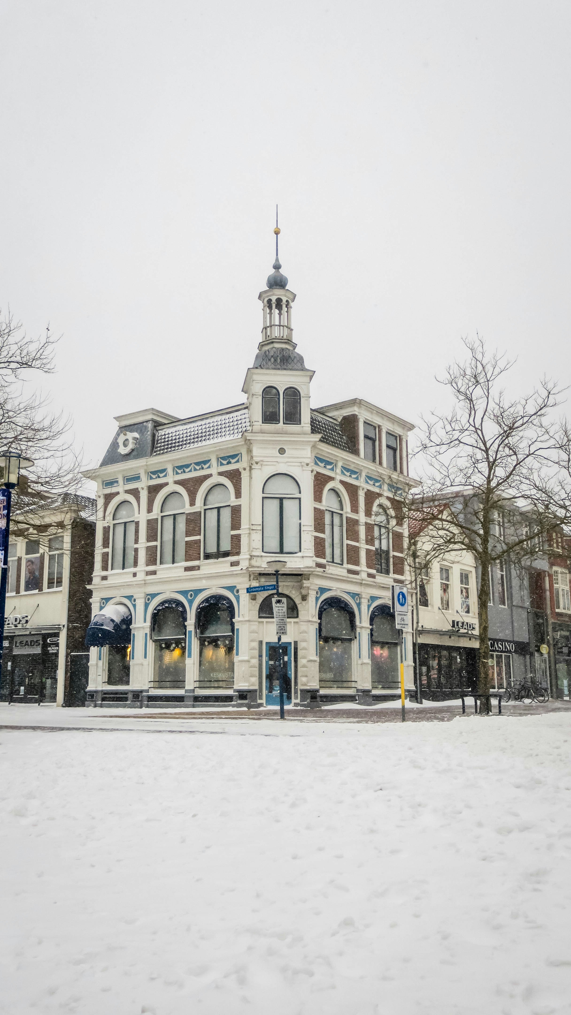 brown and white concrete building during daytime
