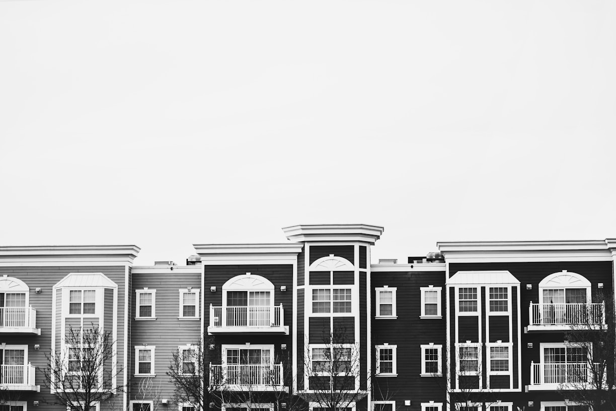 grayscale photo of concrete building