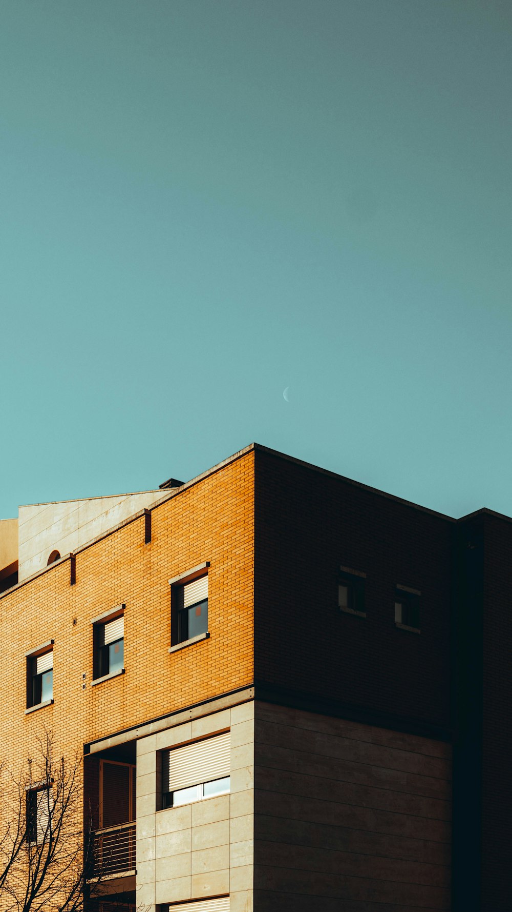 brown concrete building under blue sky during daytime