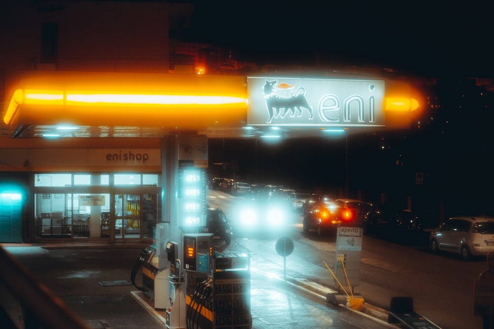 black car on road during night time