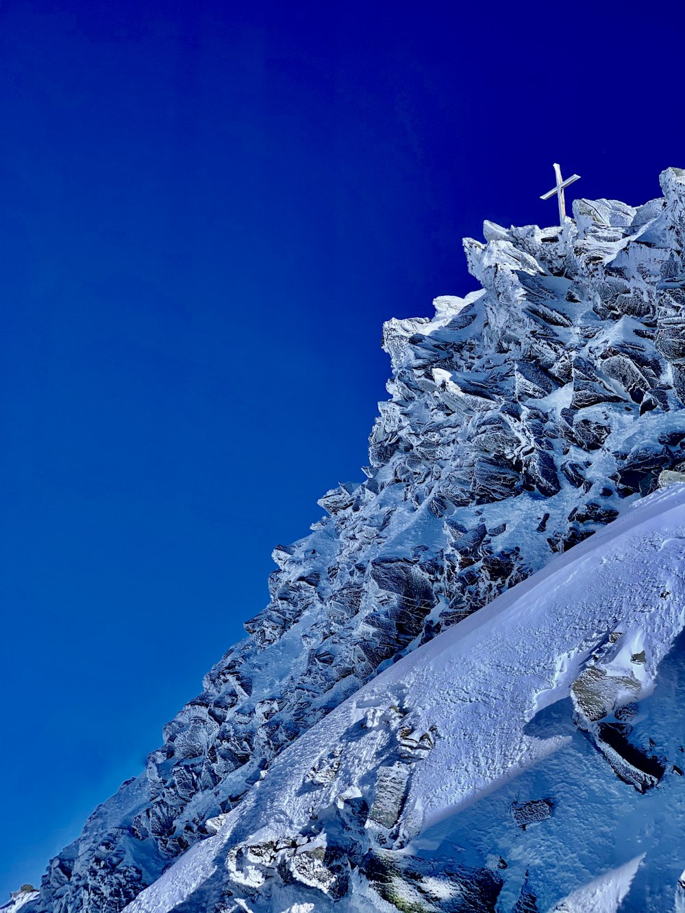 gray and white rock formation under blue sky during daytime