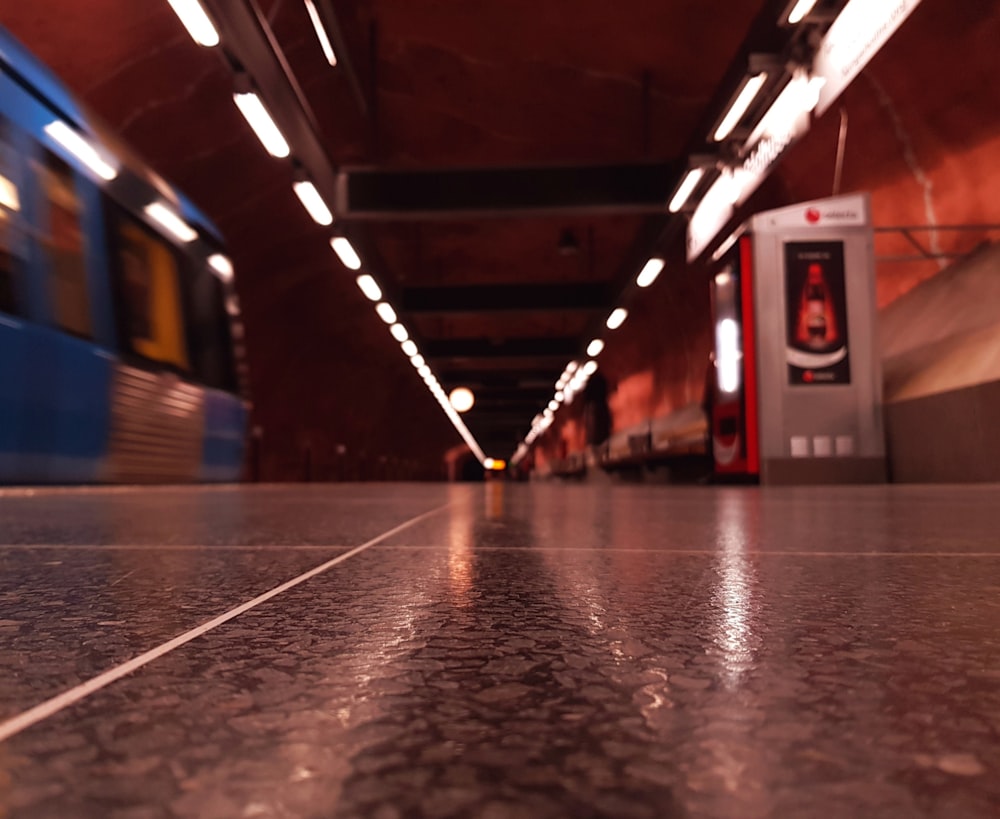 red and white train in tunnel