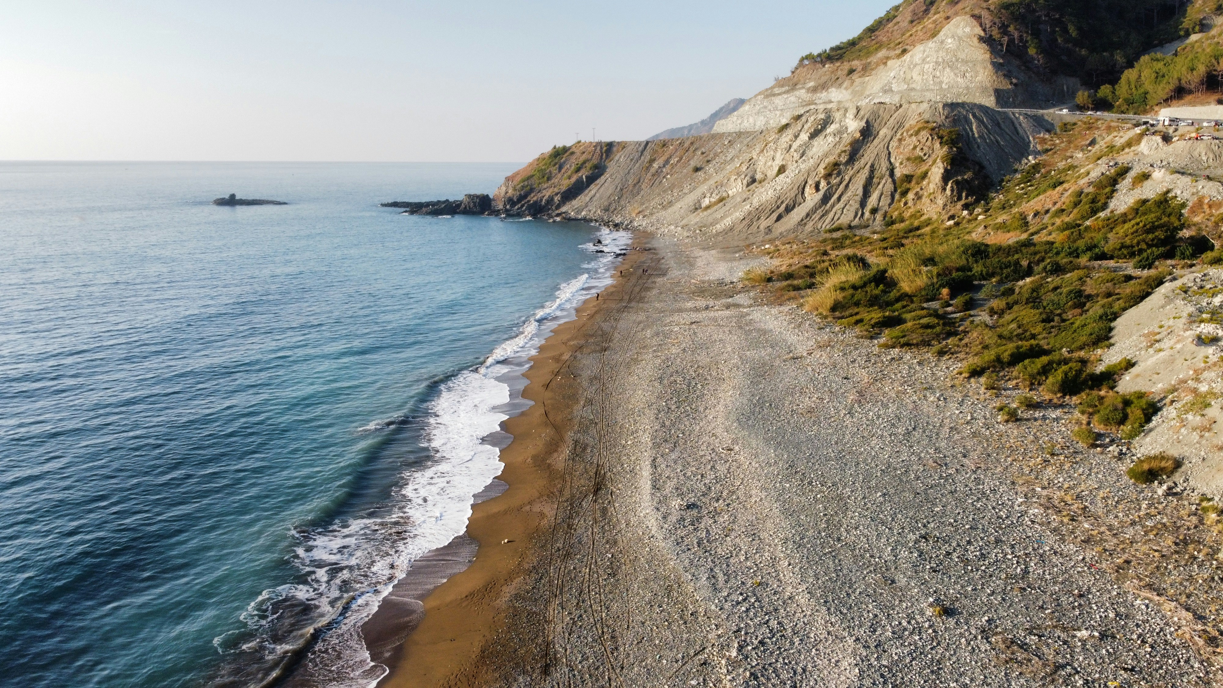 brown sand beach during daytime