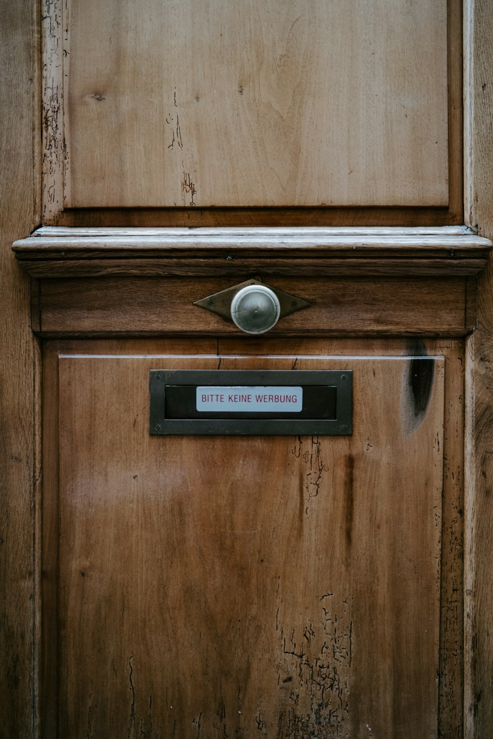 a close up of a door with a sign on it