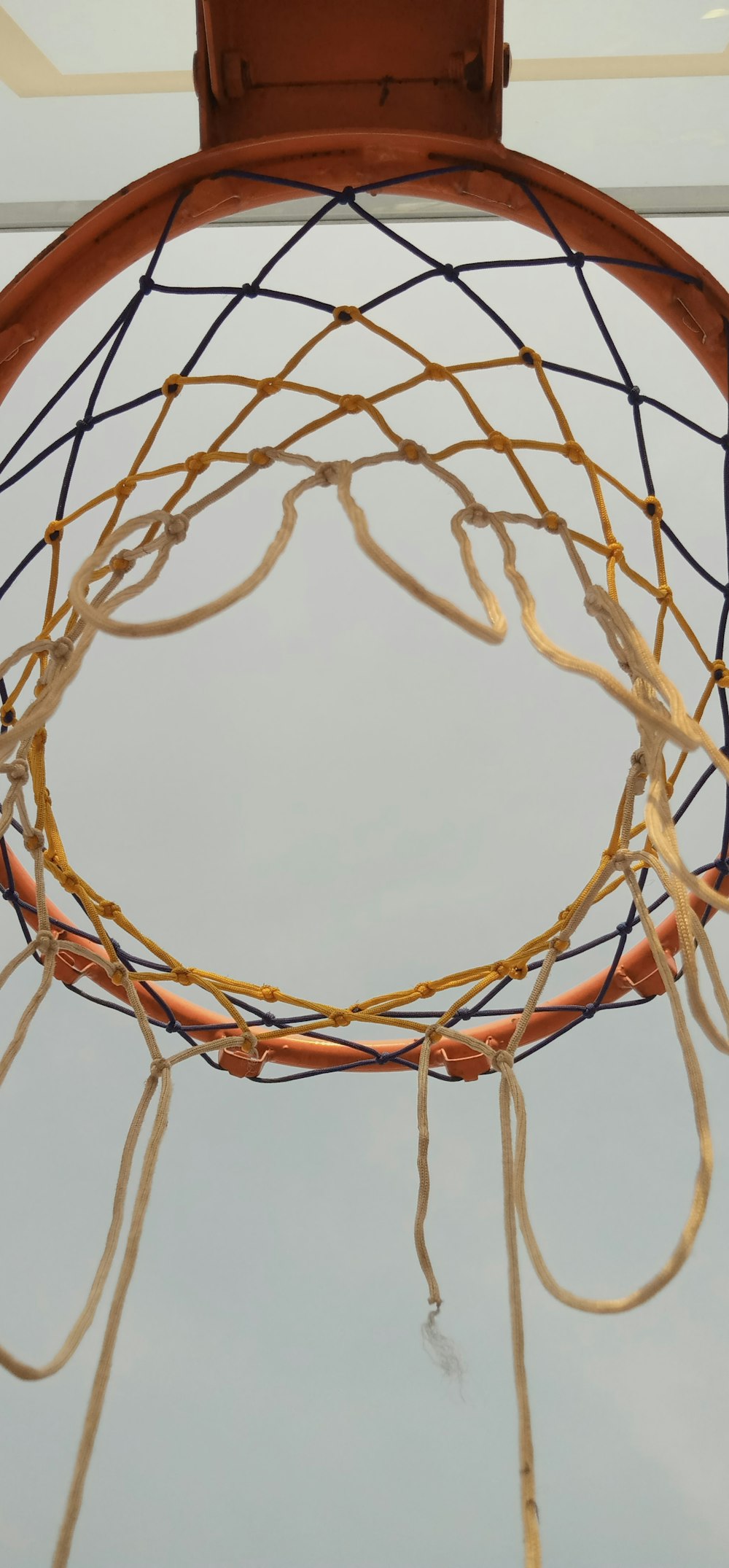 brown and white basketball hoop