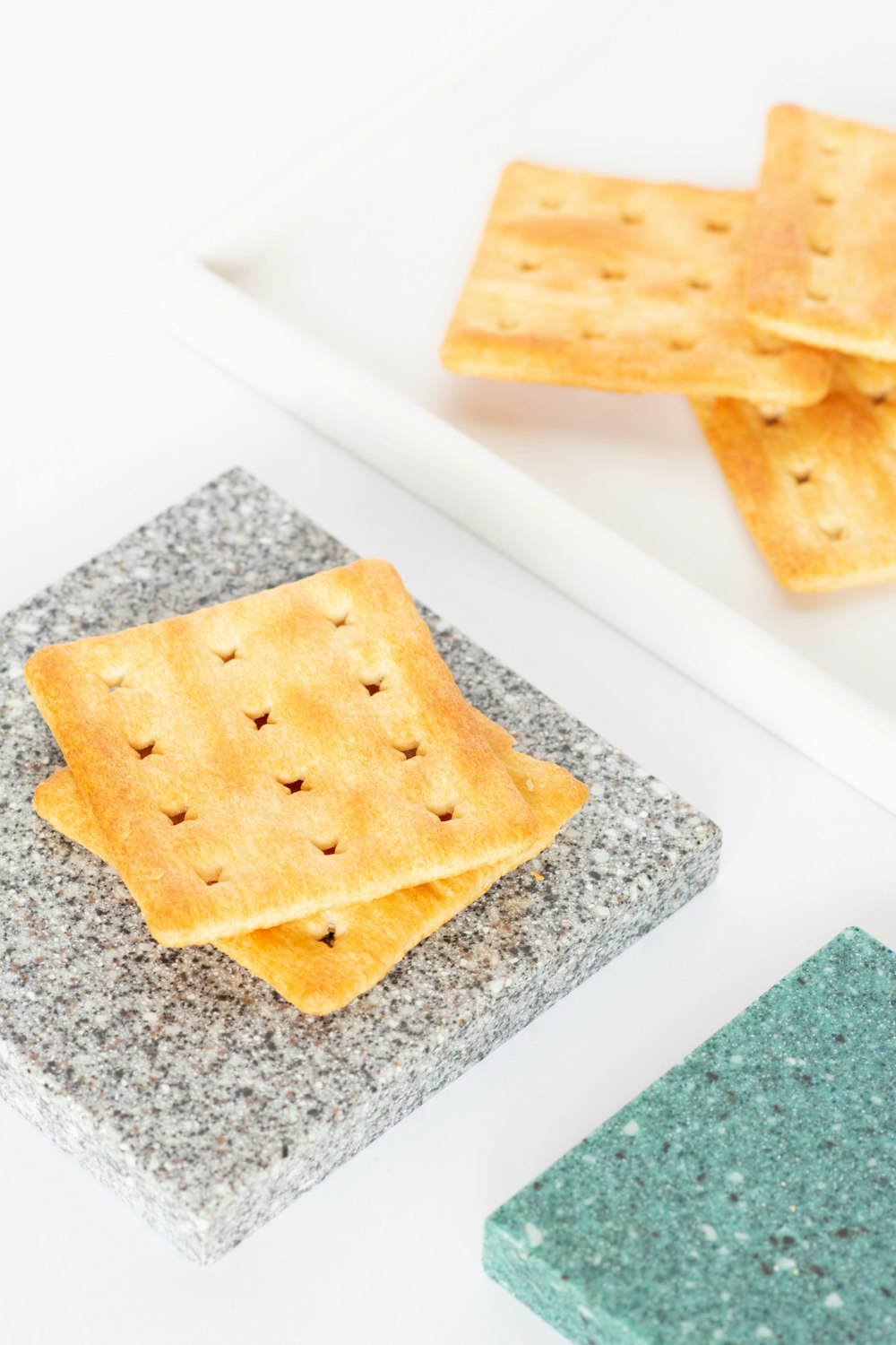 a plate of crackers sitting on top of a table