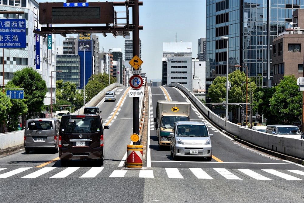 black car on road during daytime