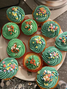 green pink and blue floral cupcakes