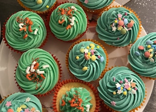 green pink and blue floral cupcakes