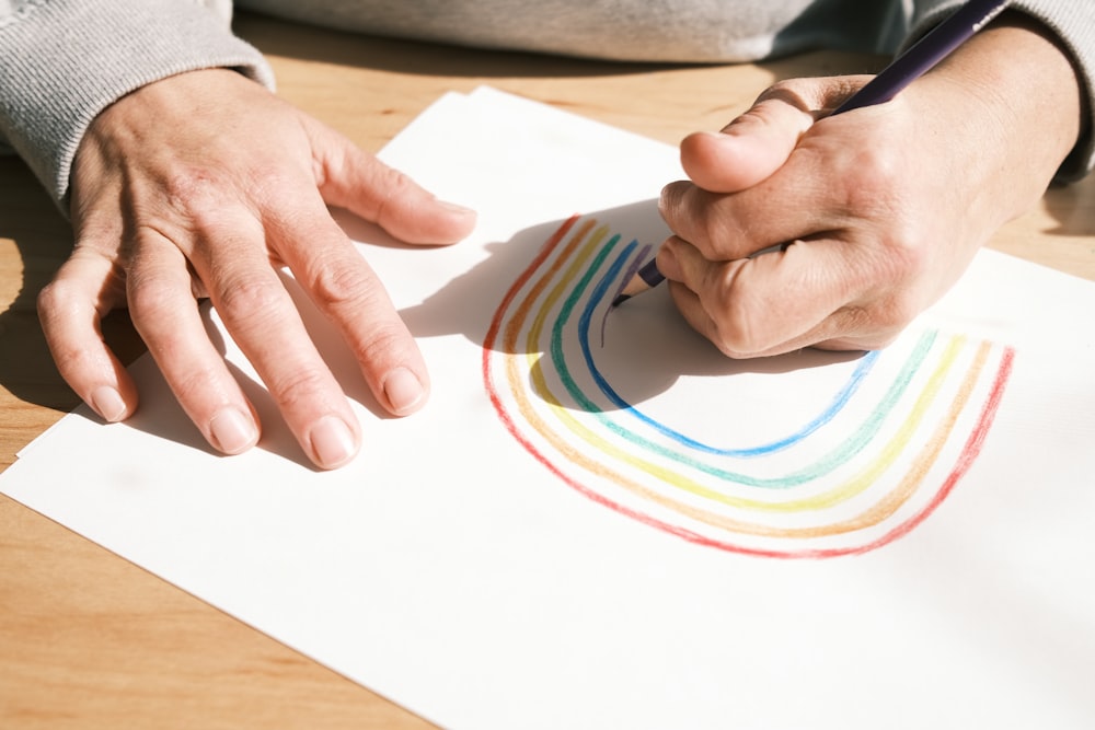 person holding white printer paper