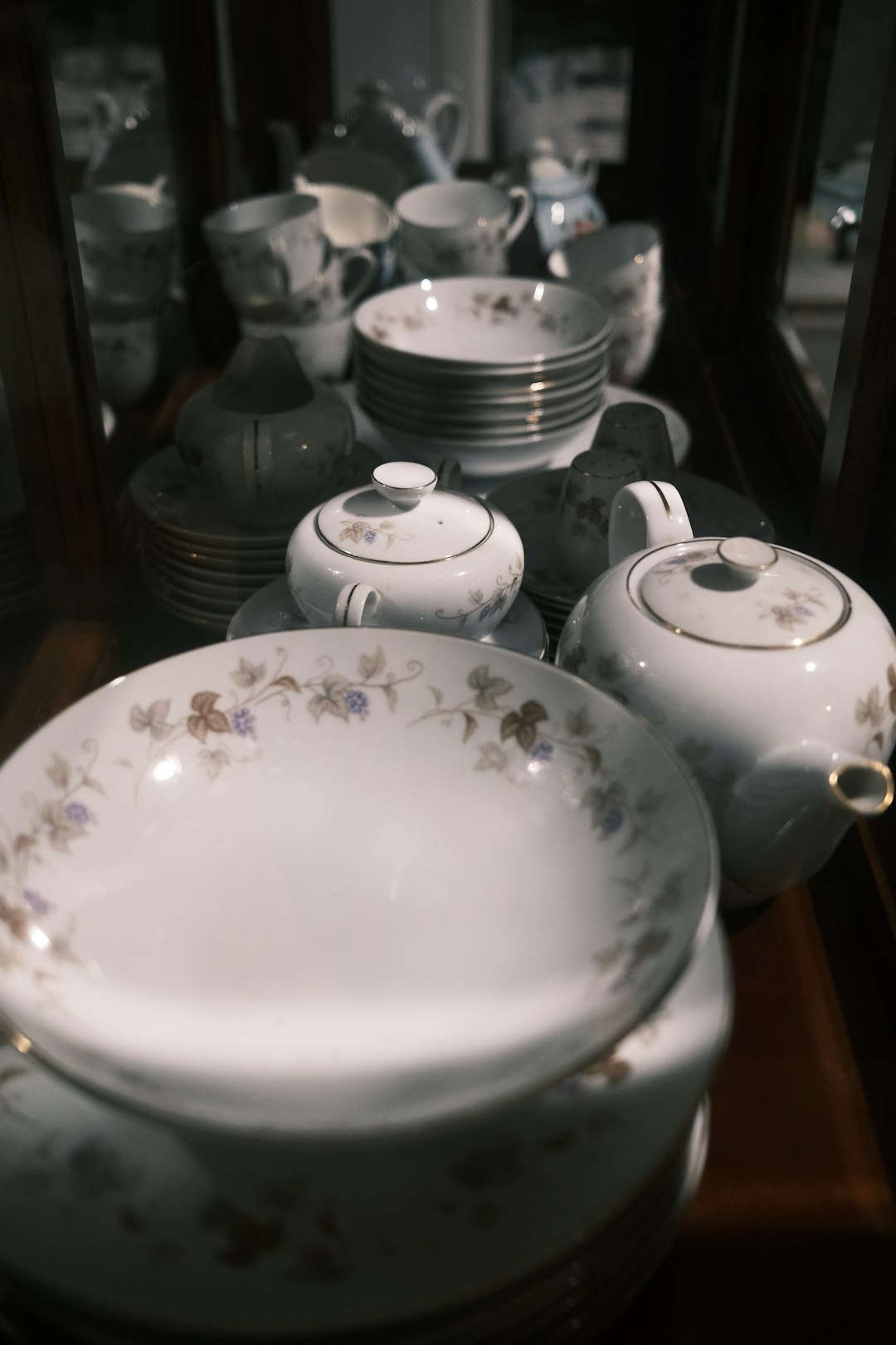 white ceramic plates on table
