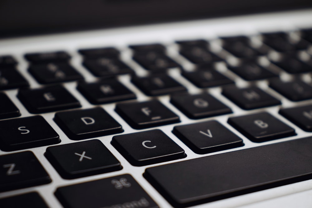 black and silver laptop computer