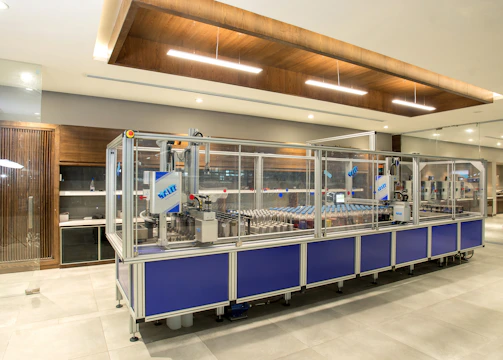 A modern manufacturing plant bustling with activity and machinery.