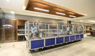 A modern industrial setting with automated machinery in operation.