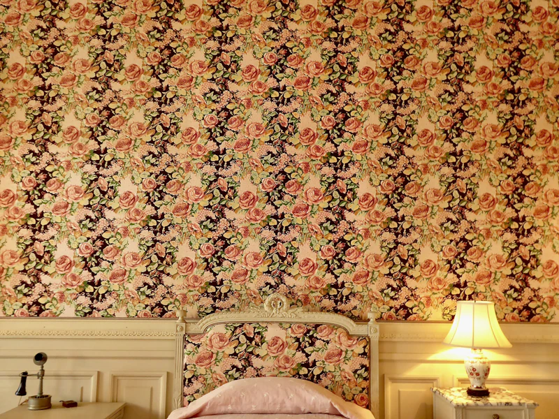 Floral pattern wallpaper installation