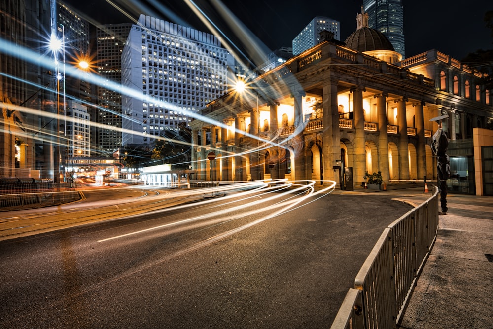 time lapse photography of cars on road during night time