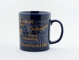 A ceramic mug showcasing a witty quote in bold typography with bright accents.