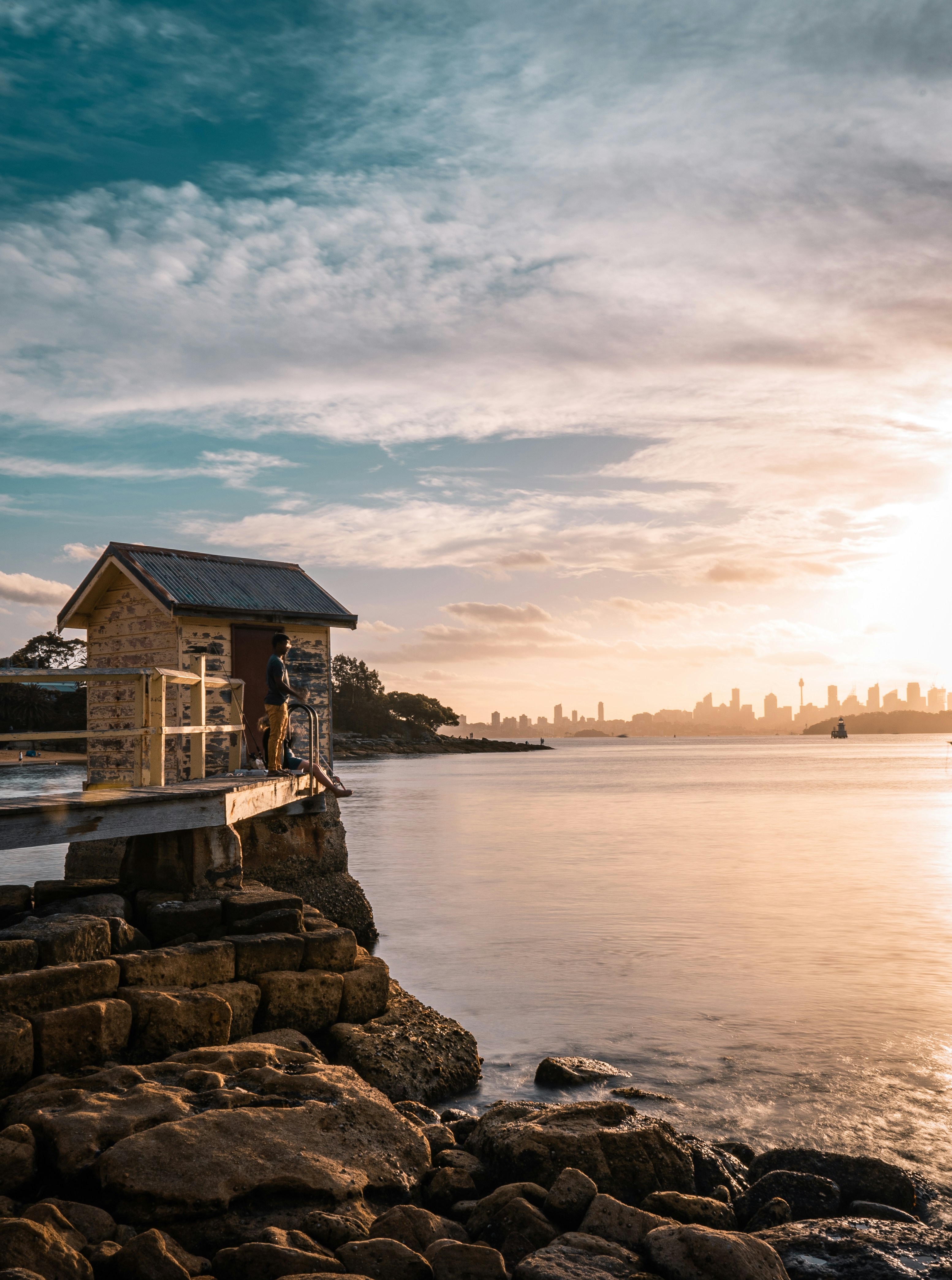 Brown wooden house near body of water during daytime photo – Free ...