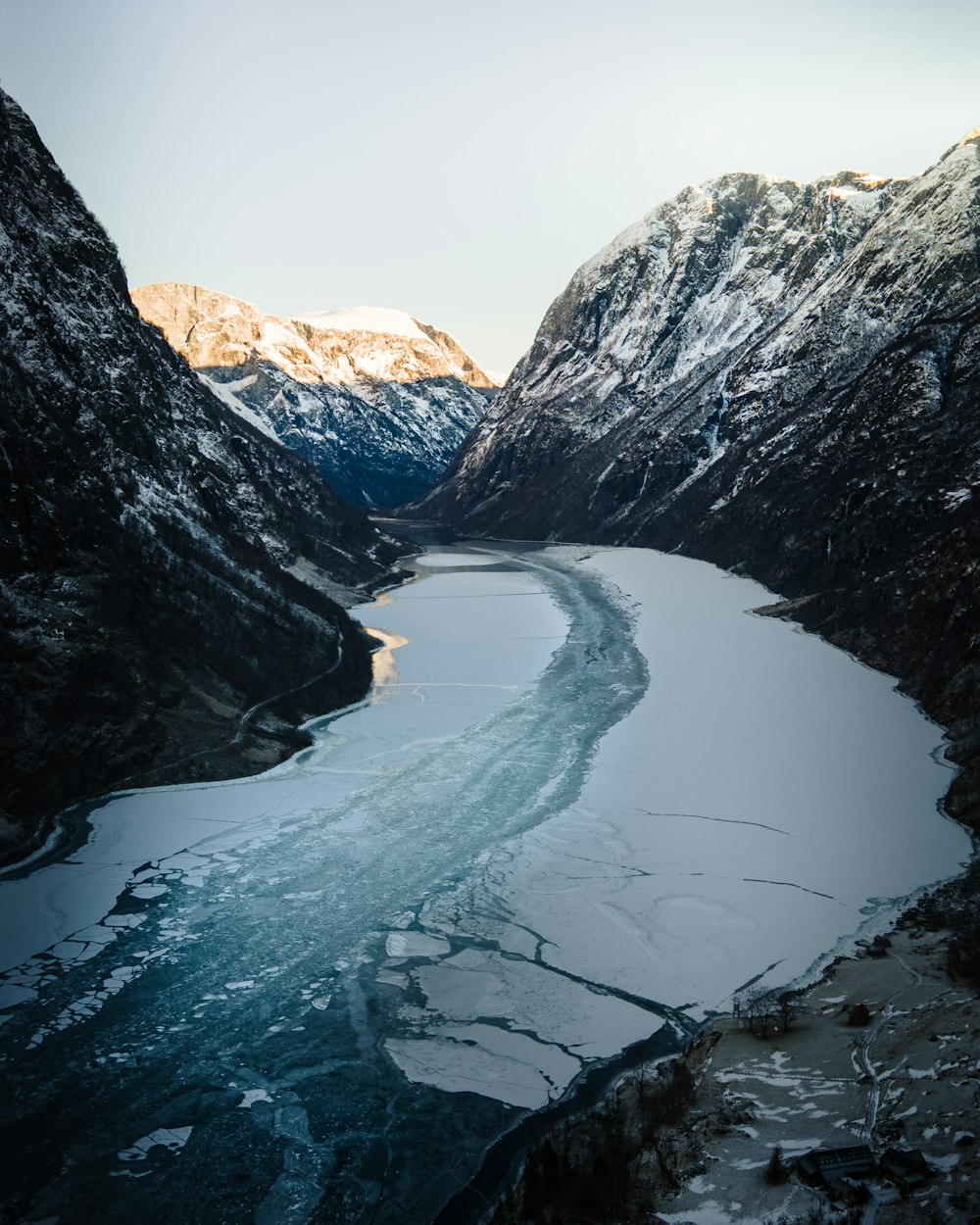 river between rocky mountains during daytime