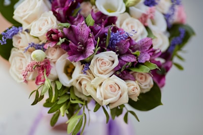 An elegant bouquet featuring white lilies and soft lavender accents, perfect for any occasion.