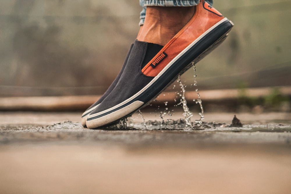 black and orange nike high top sneakers