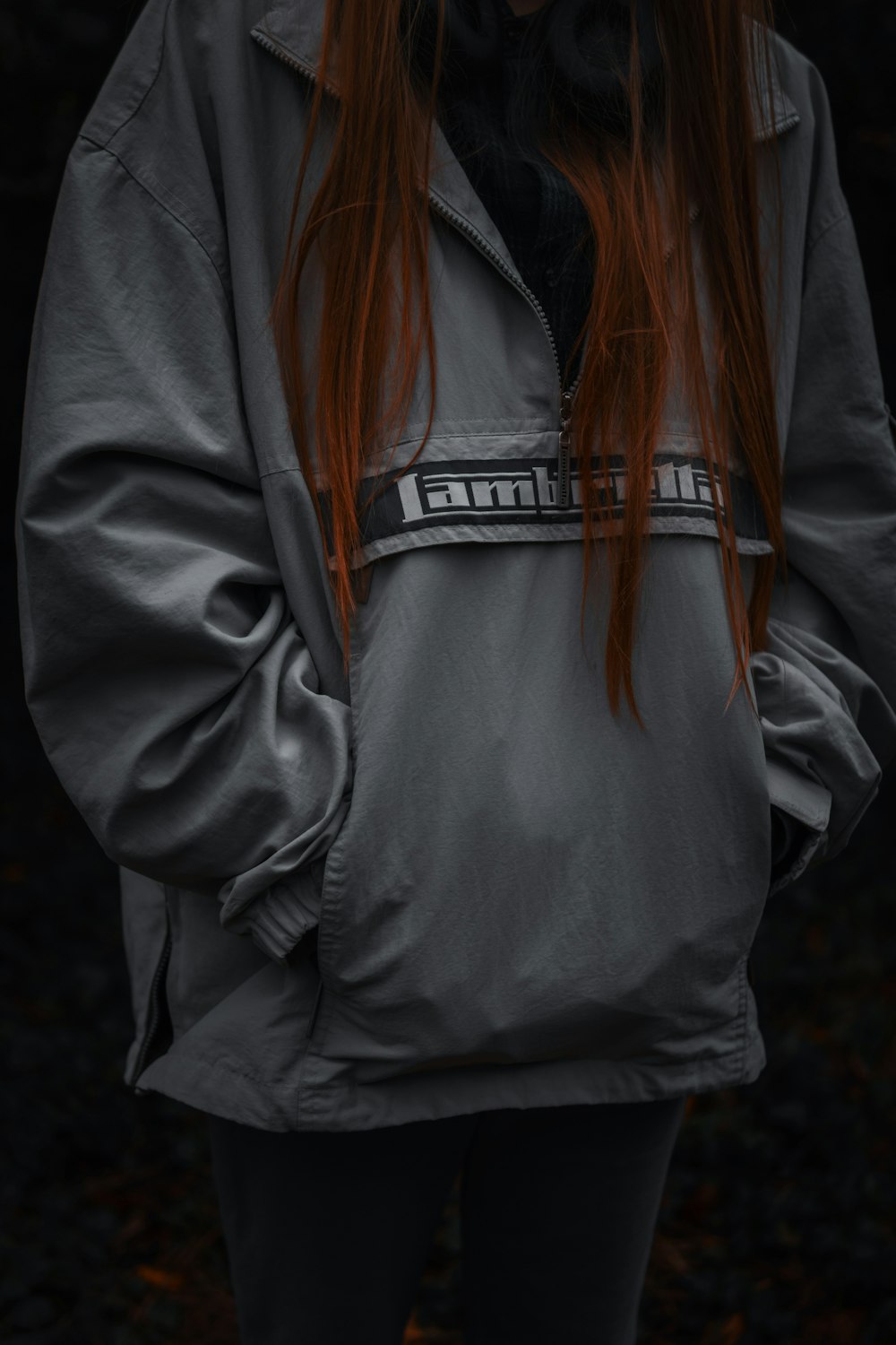 woman in gray and white zip up jacket