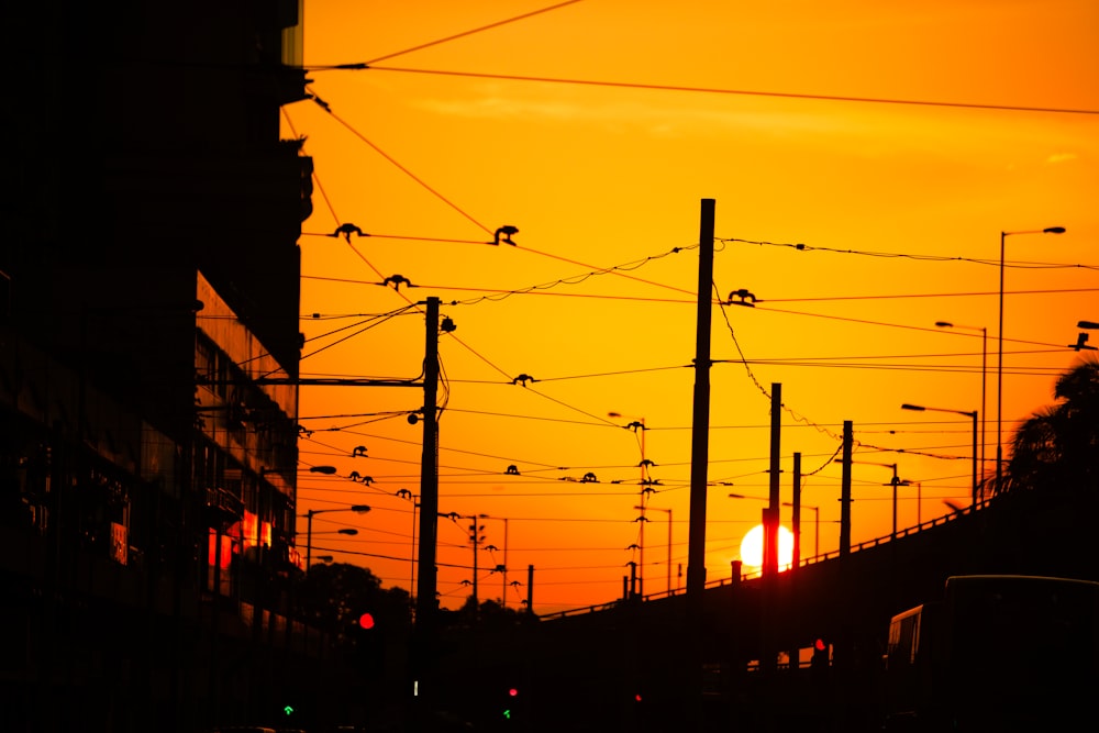 silhouette of buildings during sunset