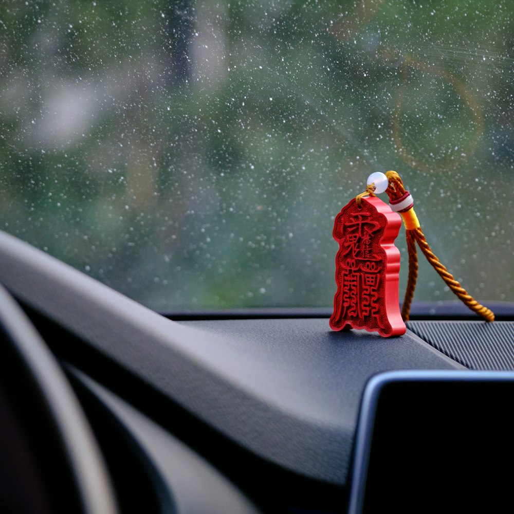 person in red and white santa claus costume sitting on car seat