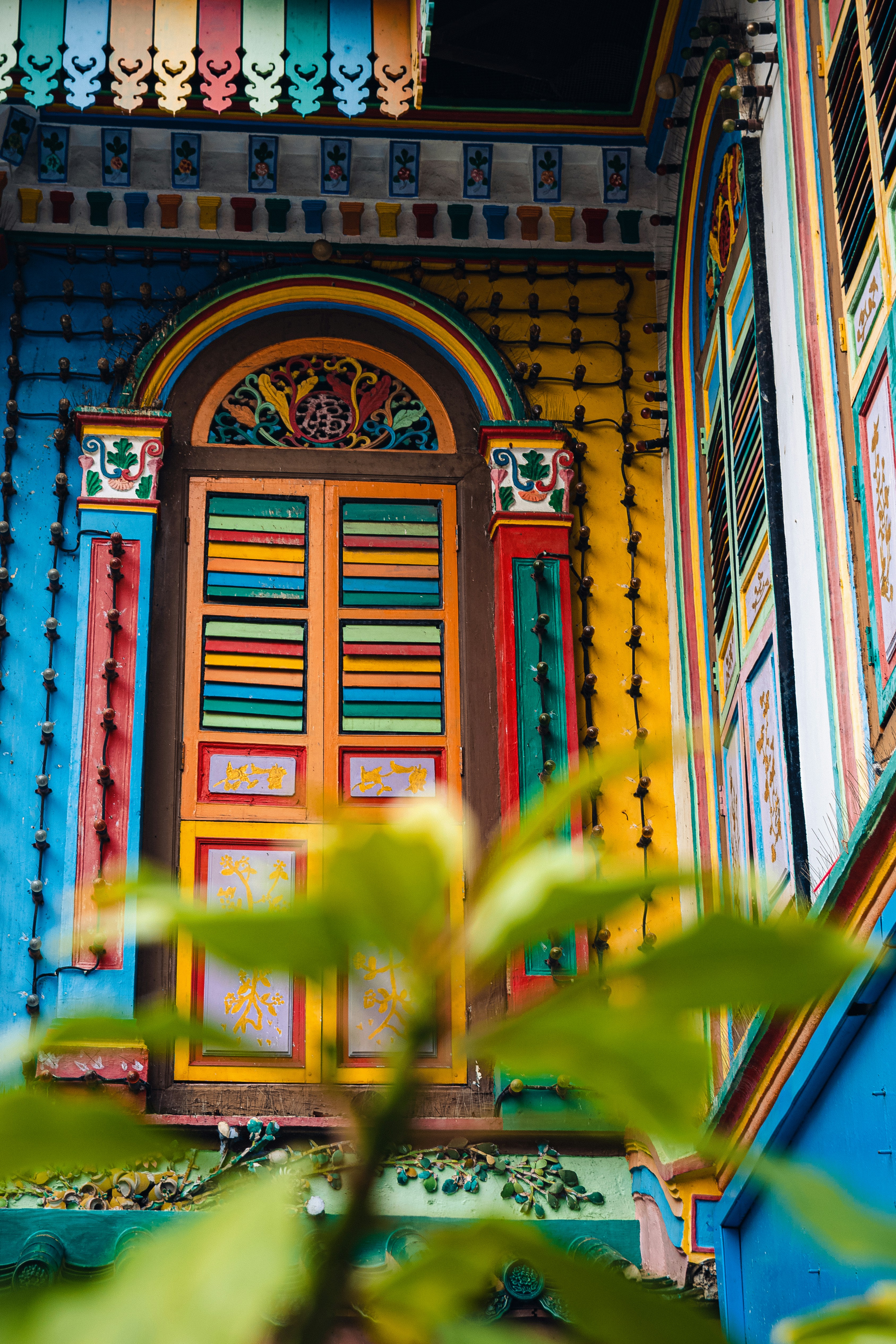red blue and green wooden door
