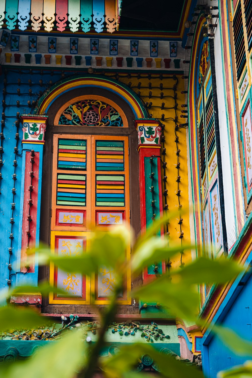 red blue and green wooden door