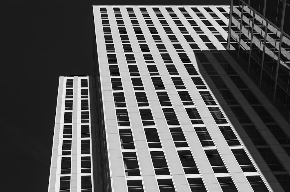 grayscale photo of high rise building