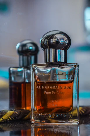 a bottle of perfume sitting on top of a table