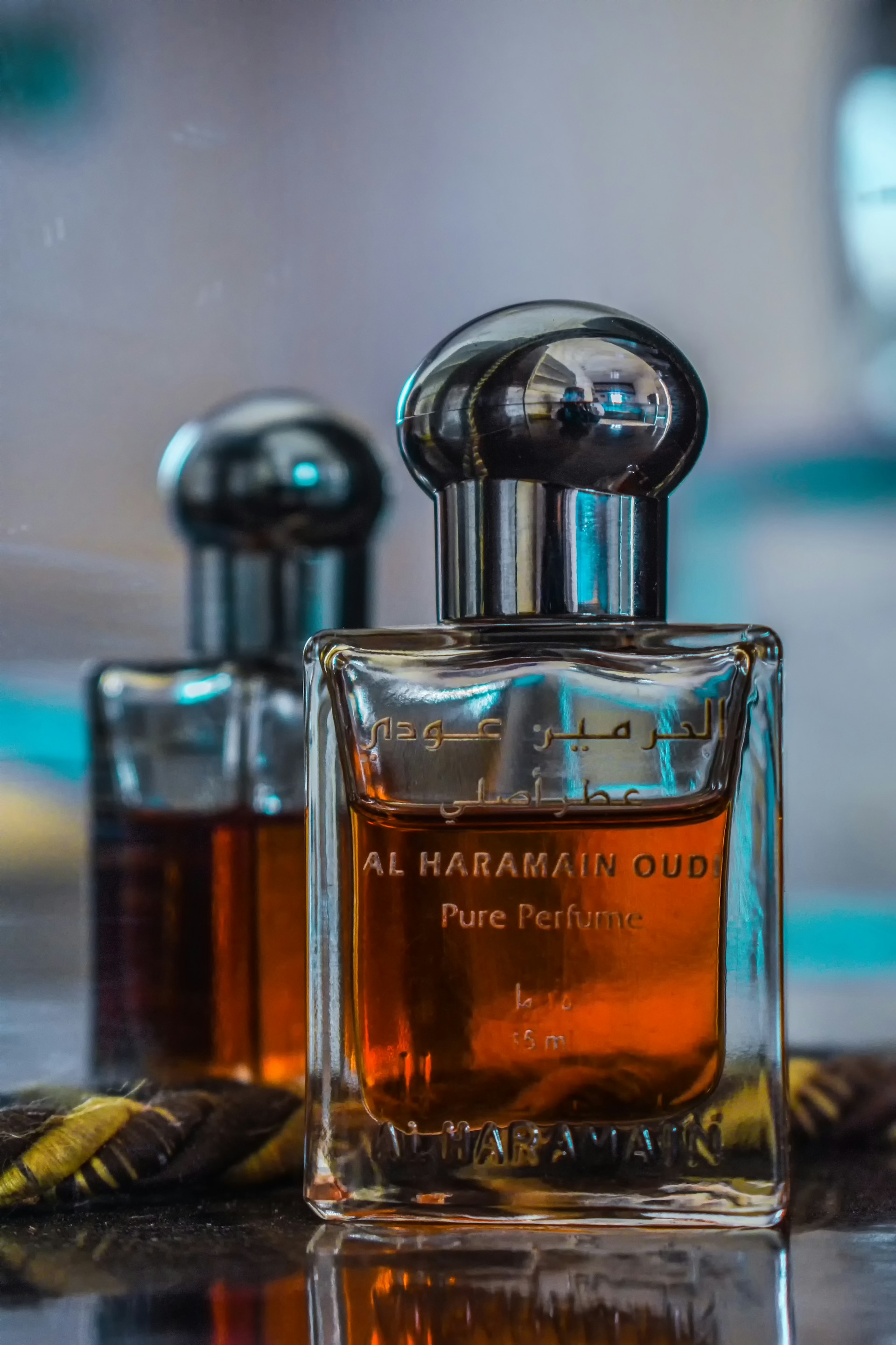 a bottle of perfume sitting on top of a table