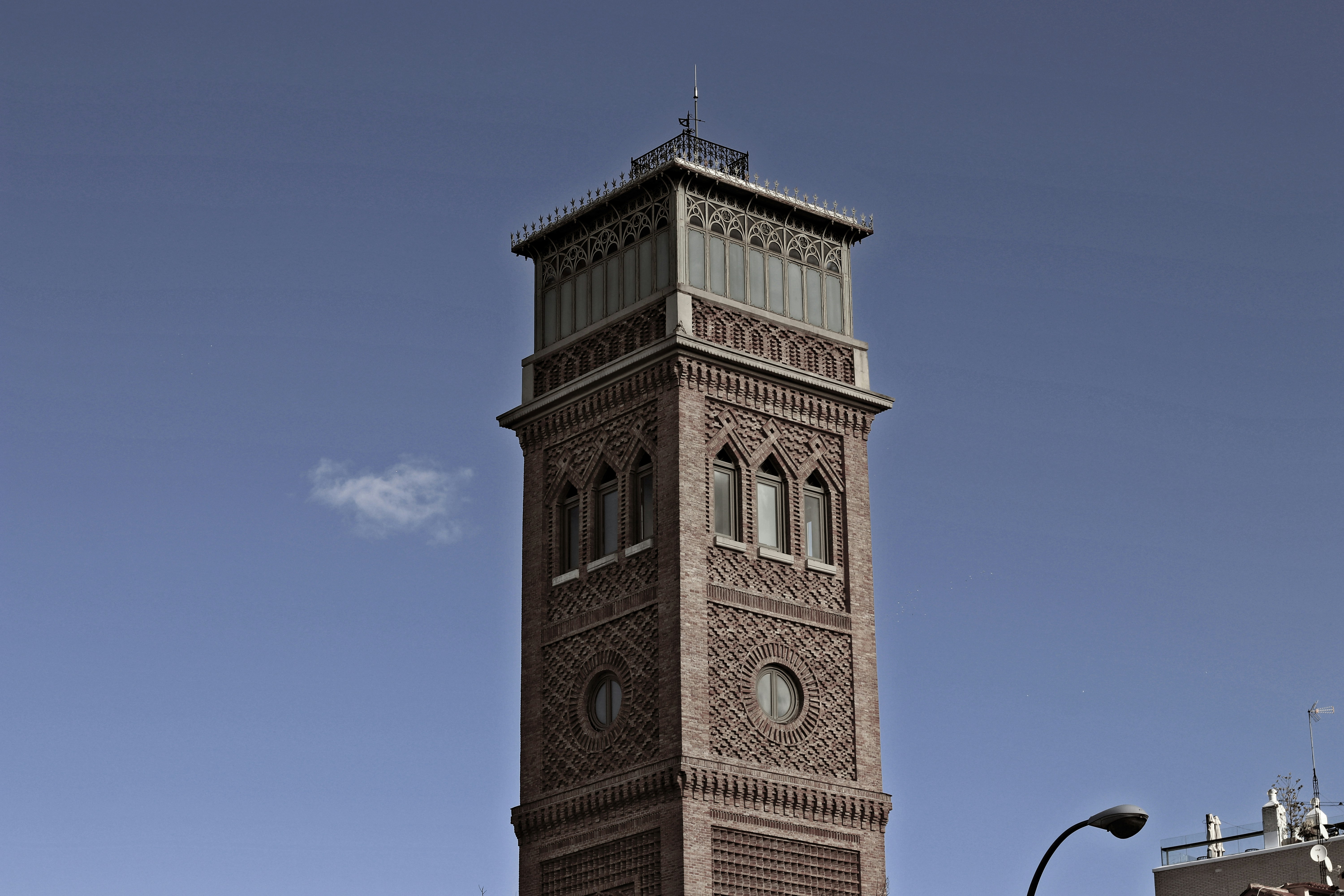 brown concrete building under blue sky during daytime