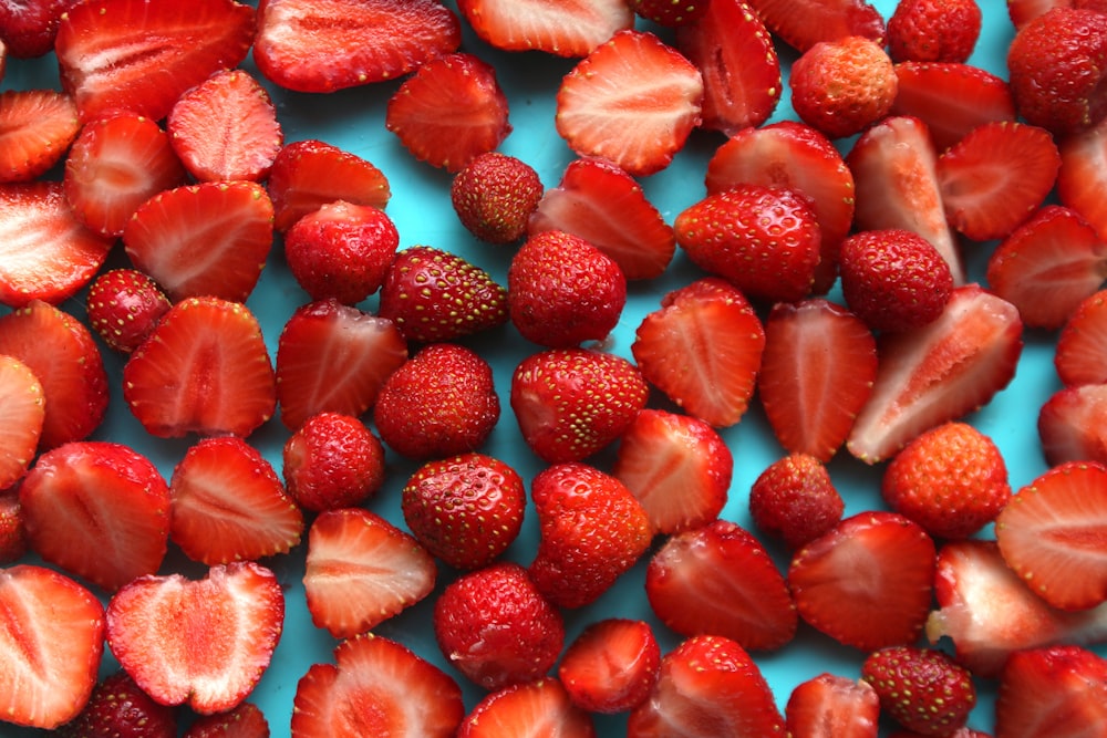 red strawberries on white ceramic plate