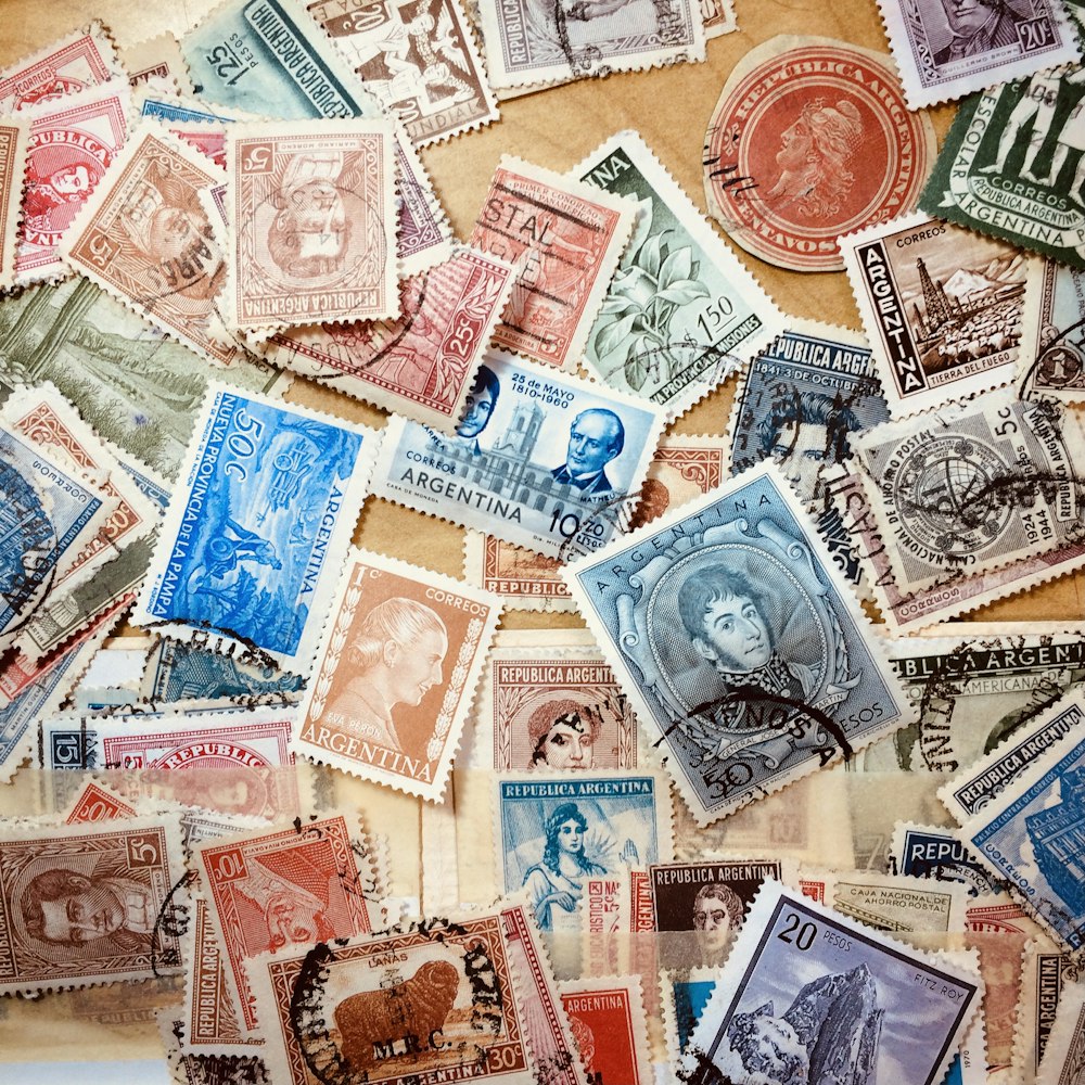 assorted coins on brown wooden table