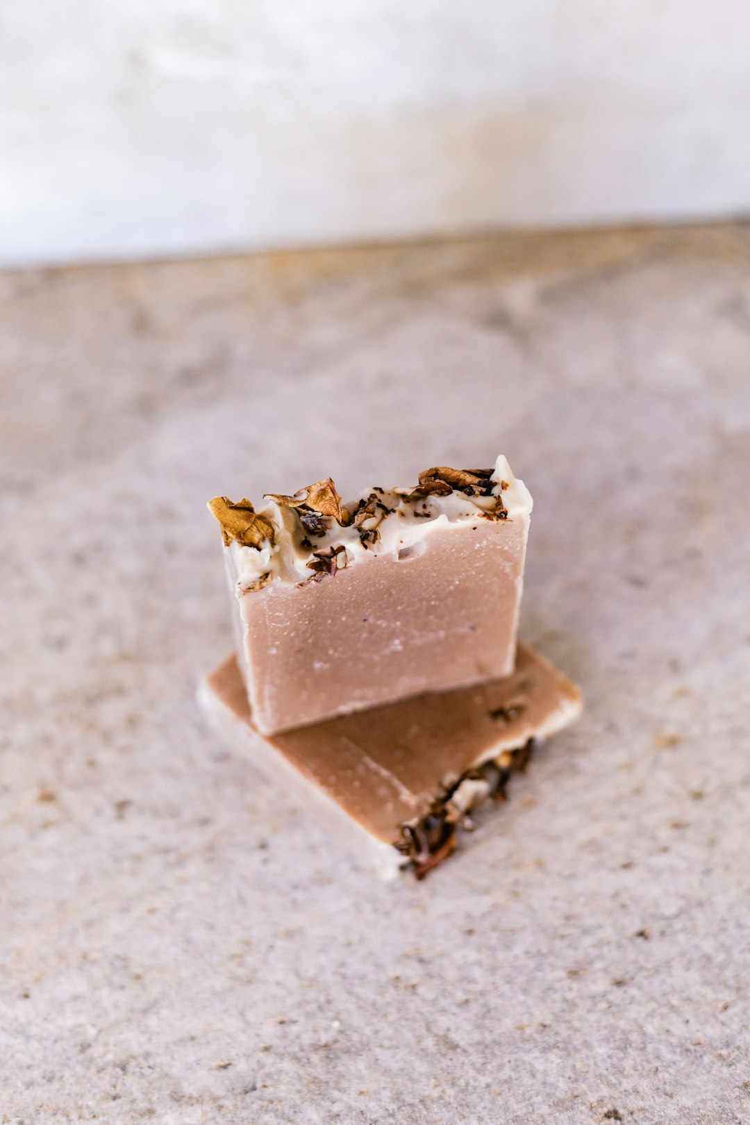 brown and white chocolate bar on white and brown marble table