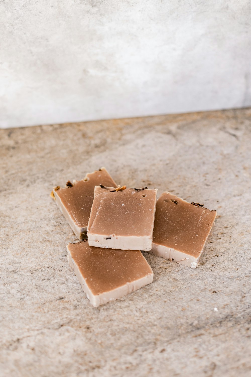 brown and white bread on white surface