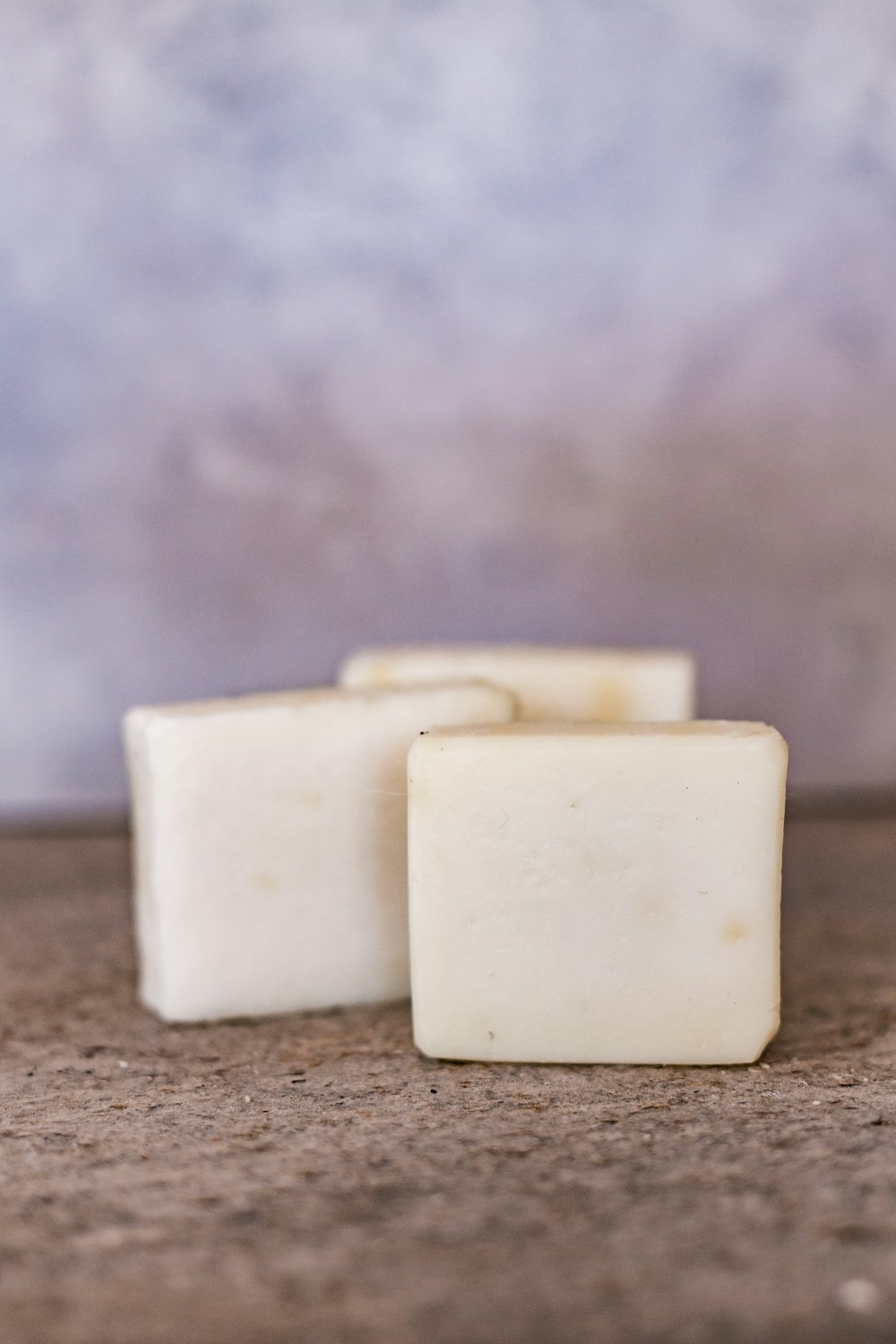 white soap on brown surface