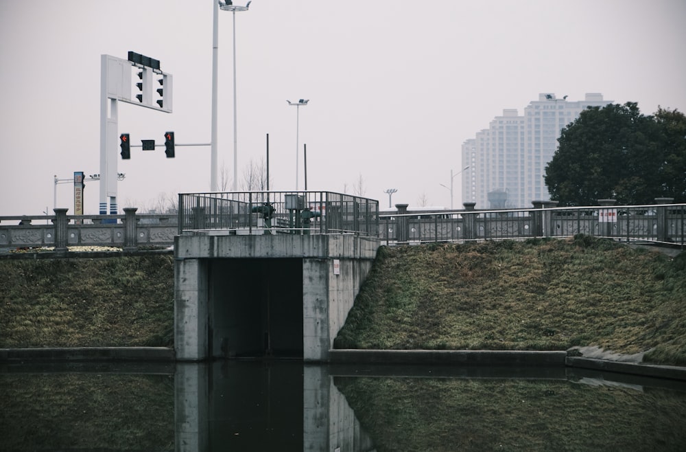 white concrete building near body of water during daytime