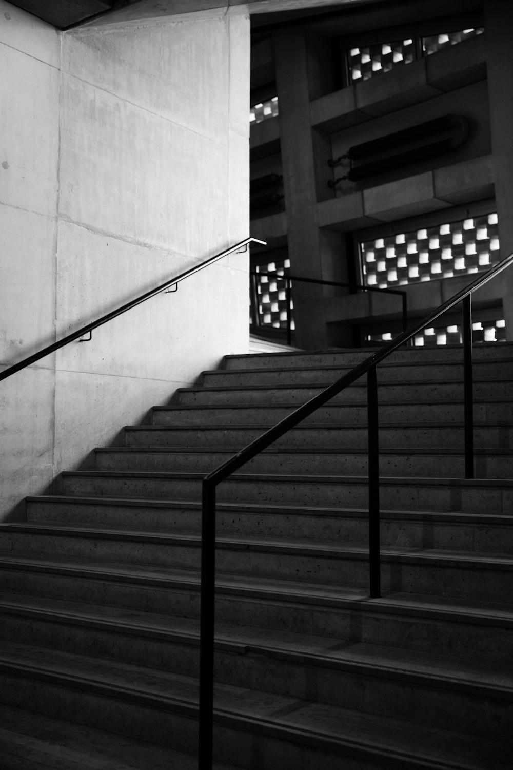 a man riding a skateboard down a set of stairs