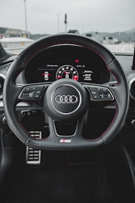 black and gray audi steering wheel