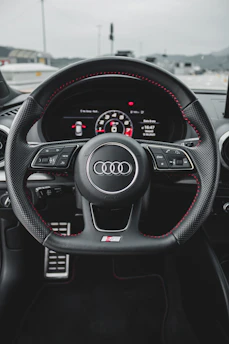 black and gray audi steering wheel