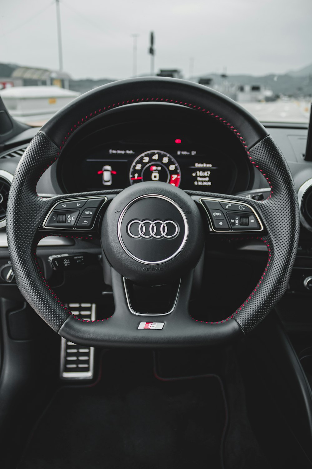 black and gray audi steering wheel